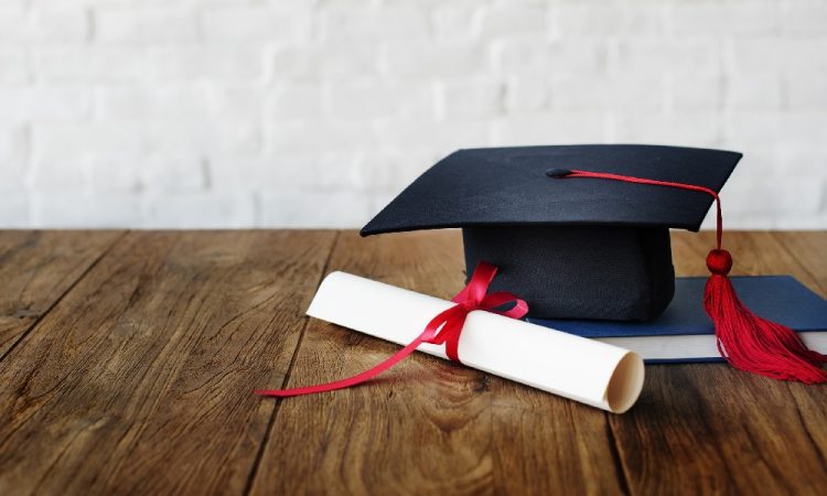 image of a graduate cap and diploma